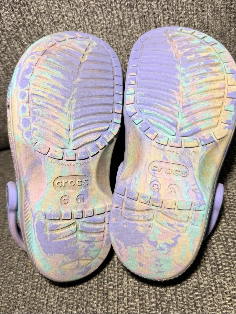 Crocs Kids' Classic Marbled Clogs in a purple/pink and blue  size C11